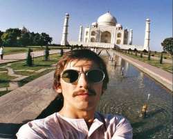 The first selfie with Taj was clicked by George Harrison using a fisheye lens.